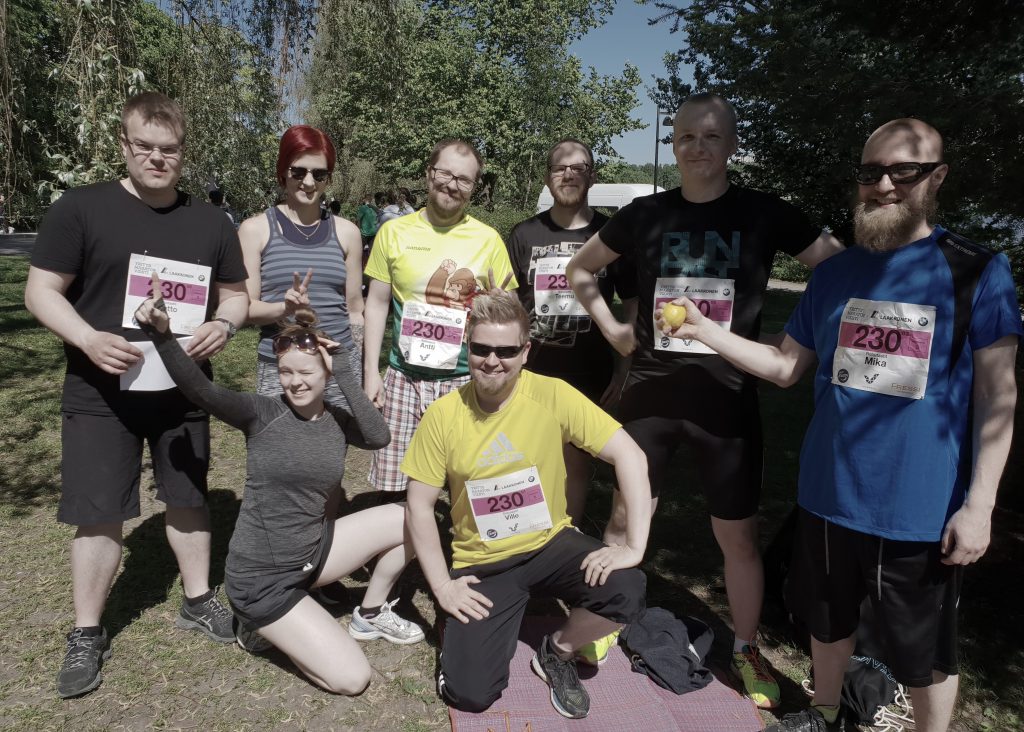 Team smiling after running competition